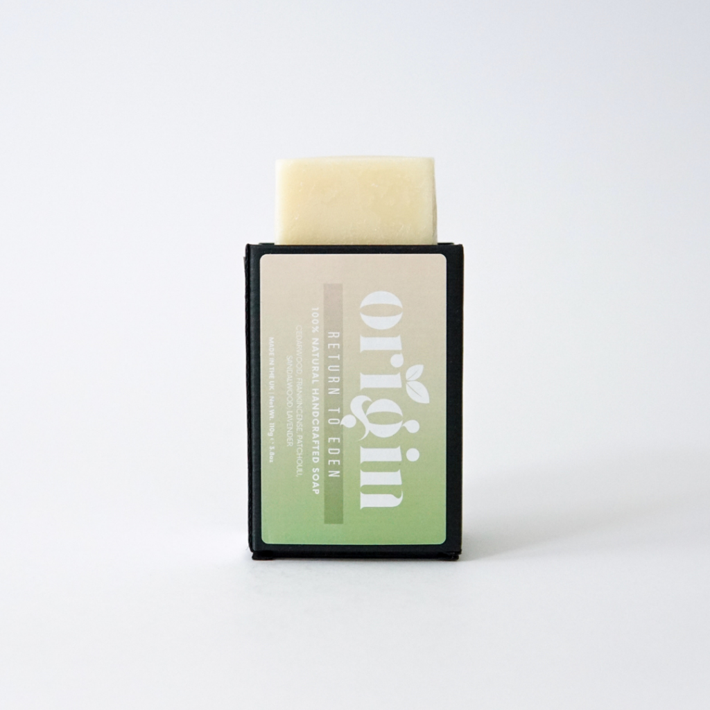 Cedarwood & Patchouli soap bar partially popping out of its upright box.