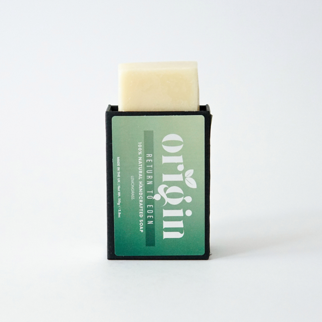 Lemongrass soap bar partially popping out of its upright box.