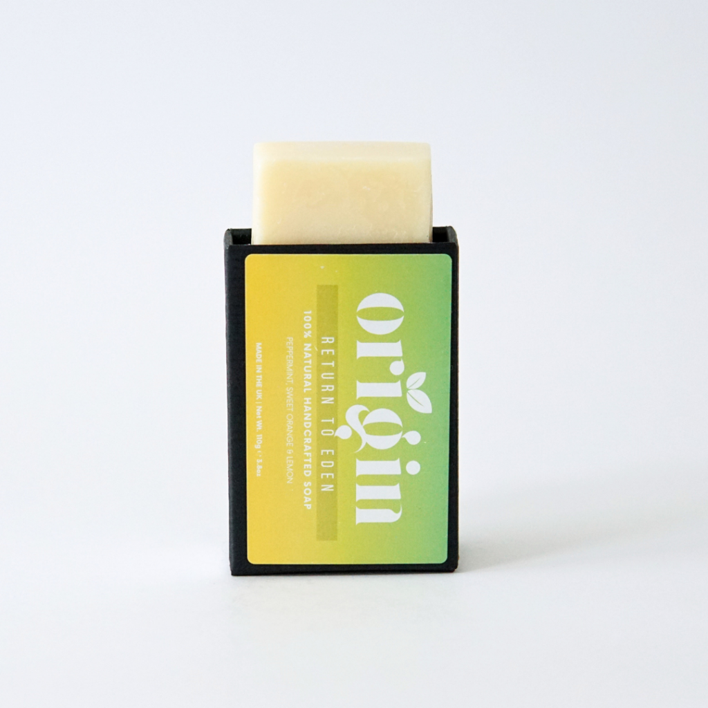 Peppermint, Sweet Orange & Lemon soap bar partially popping out of its upright box.