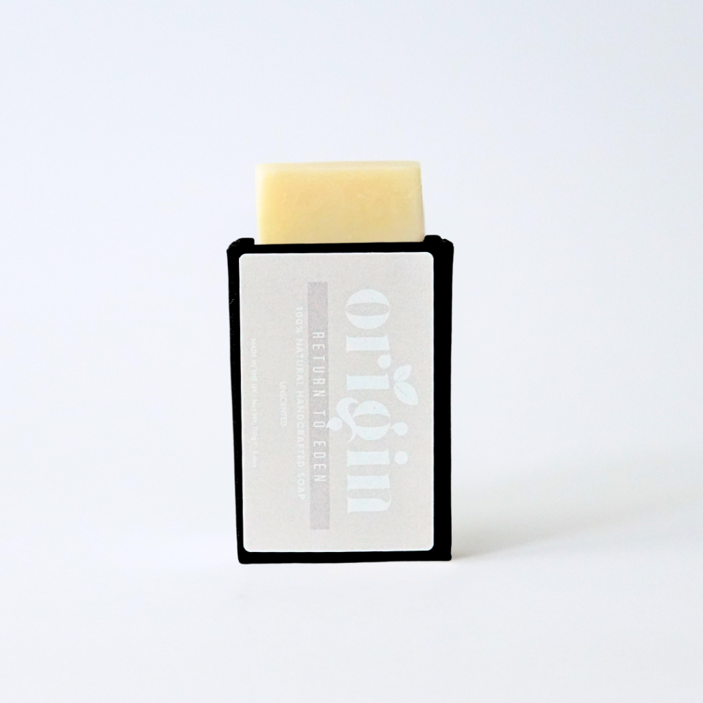 Unscented tallow soap bar partially popping out of its upright box.