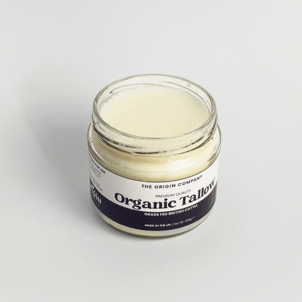 Open jar of organic beef tallow 300g top view
