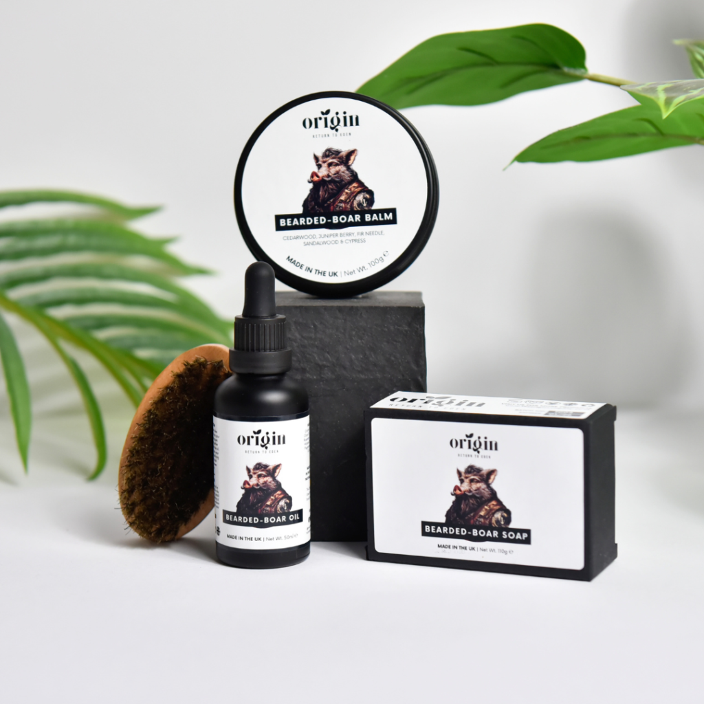 Bearded Boar Tallow Gift Set including tallow balm, beard oil, tallow soap, and boar bristle brush displayed together.