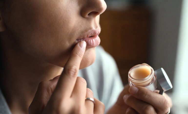 Tallow lip balm in natural setting for dry, chapped lips