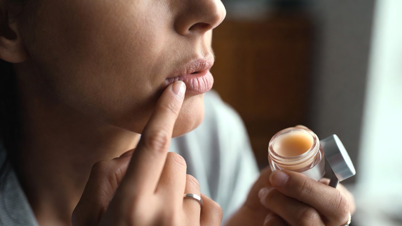 Tallow lip balm in natural setting for dry, chapped lips