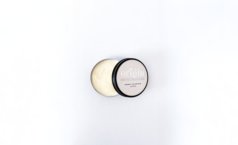 minimal skincare scene showing natural skin texture and soft lighting representing non-comedogenic tallow use