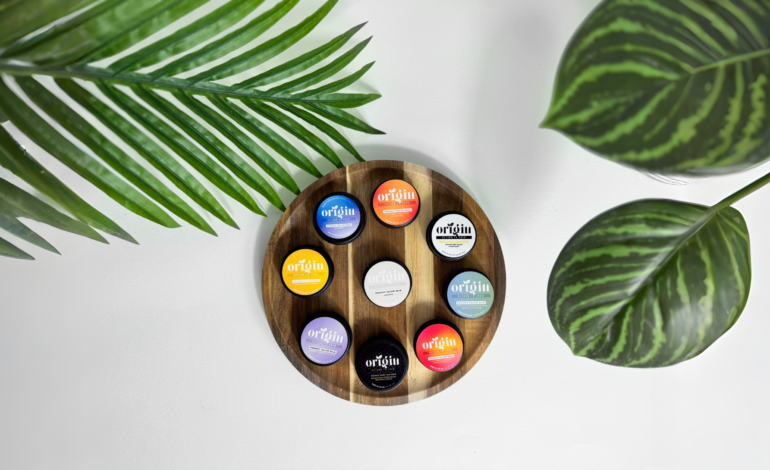 Laptop showing skincare reviews alongside natural tallow balm texture comparison samples